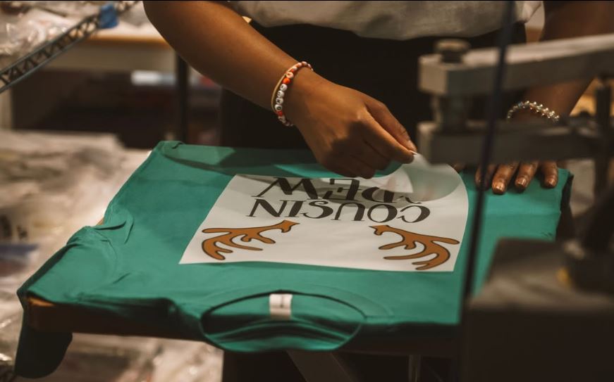 UCP DTF printer producing vibrant full-color apparel transfers